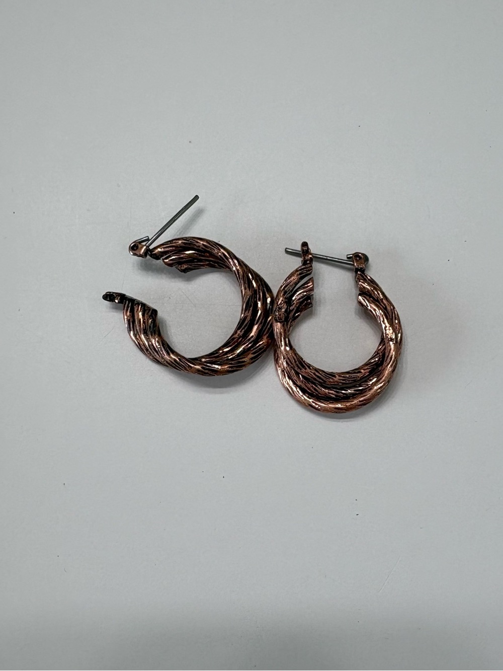 Twisted Hoop Earrings in Rose Gold Tone